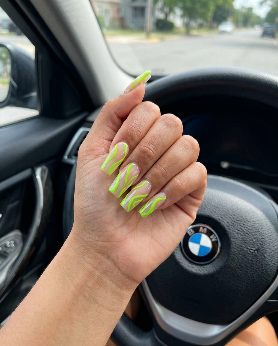 Lime Green Abstract Lines Square Nails 2026 Lime Green Abstract Lines Square nails for summer 2026: clear base with vibrant neon green lines.