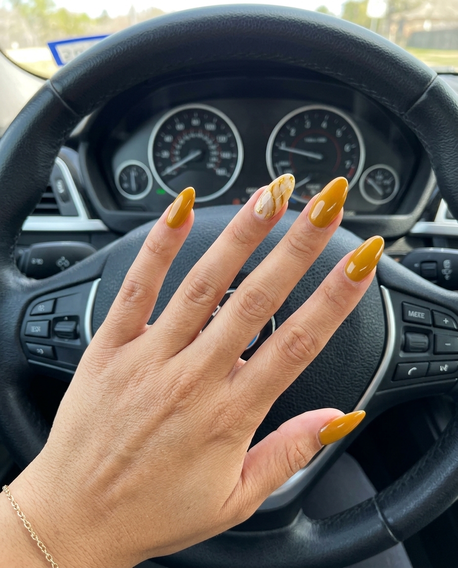 Mustard Yellow Marble Accent Nails 2026 Mustard yellow marble accent nails for weddings 2026. Sophisticated artisanal look.