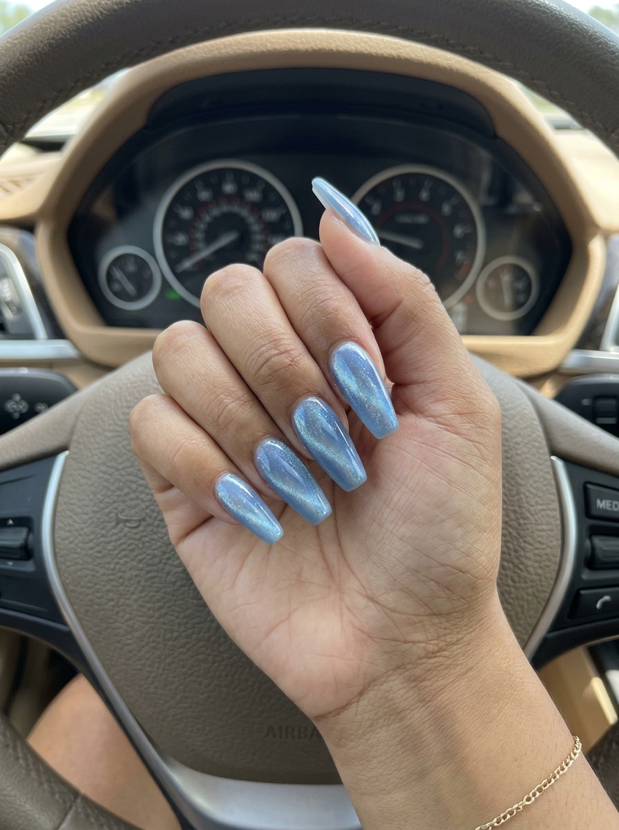 Milky Blue Cat-Eye Nails 2026 | Mystical Shine Milky blue cosmic cat-eye nails for trending summer nails 2026, perfect for date nights and evening outs.
