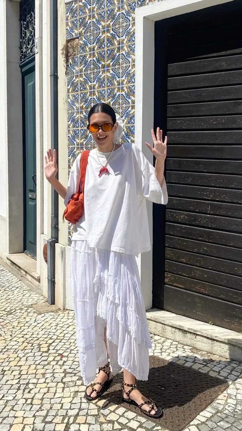 White Ruffled Skirt with Oversized Tee and Orange Accessories White Ruffled Skirt with Oversized Tee and Orange Accessories — Lisbon Outfits 2027