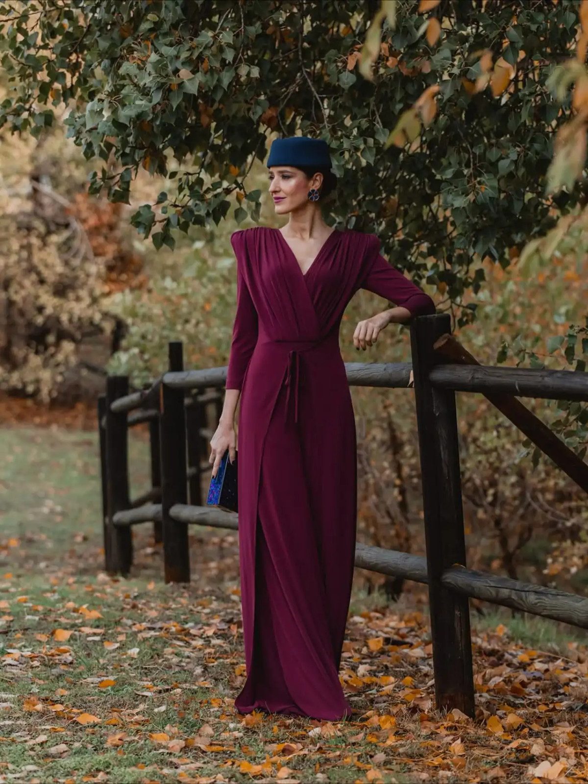 Deep Berry Crepe Wrap Dress with Fascinator for a Formal Affair Deep Berry Crepe Wrap Dress with Fascinator for a Formal Affair — Wedding Guest Outfits Cocktail 2027
