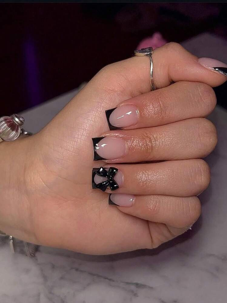 Sheer Pink Black French 3D Bow Square Nails — Close-Up Take Sheer Pink Black French 3D Bow Square Nails — Close-Up Take — Short Bow Nails 2027