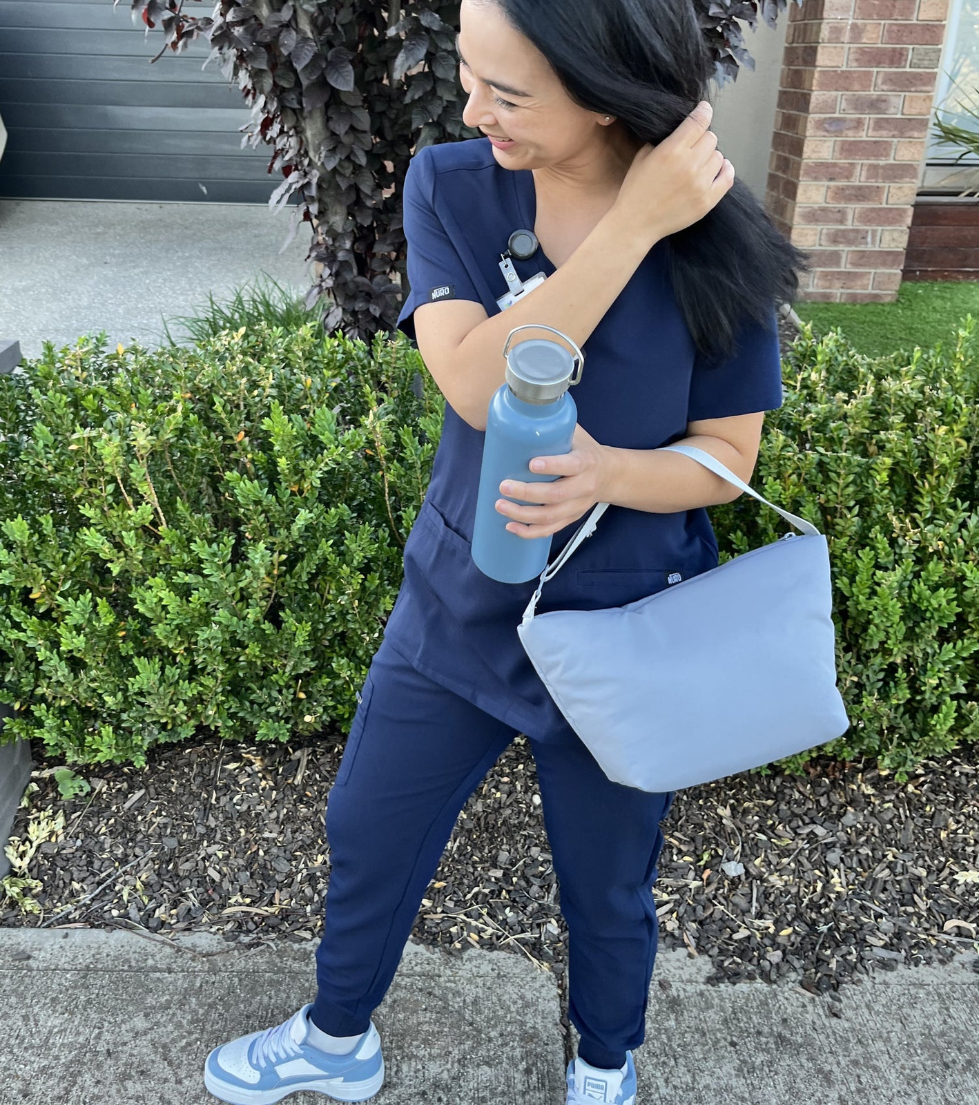 Navy Blue Jogger Scrubs with a Crossbody Bag and Sneakers Navy Blue Jogger Scrubs with a Crossbody Bag and Sneakers — Scrubs Outfits 2027