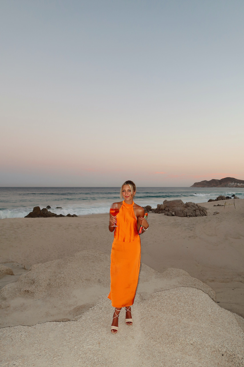 Satin-Like Orange Halterneck Maxi Dress for Beach Evenings Satin-Like Orange Halterneck Maxi Dress for Beach Evenings — Cabo Outfits 2027