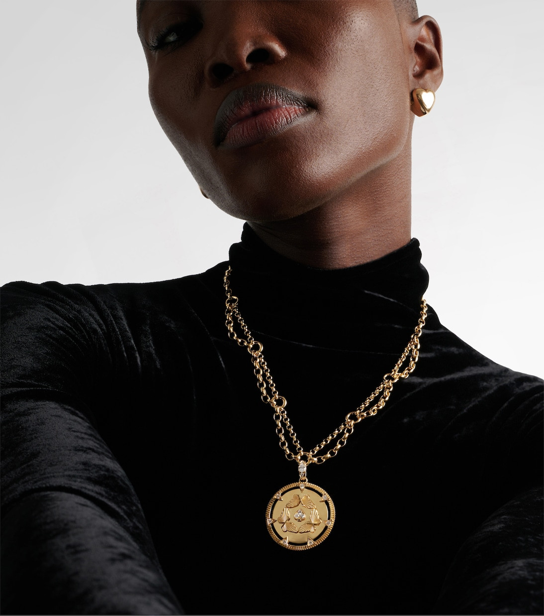 Black Velvet Turtleneck Styled with Layered Medallion Chains Black Velvet Turtleneck Styled with Layered Medallion Chains — Locket Necklaces 2027