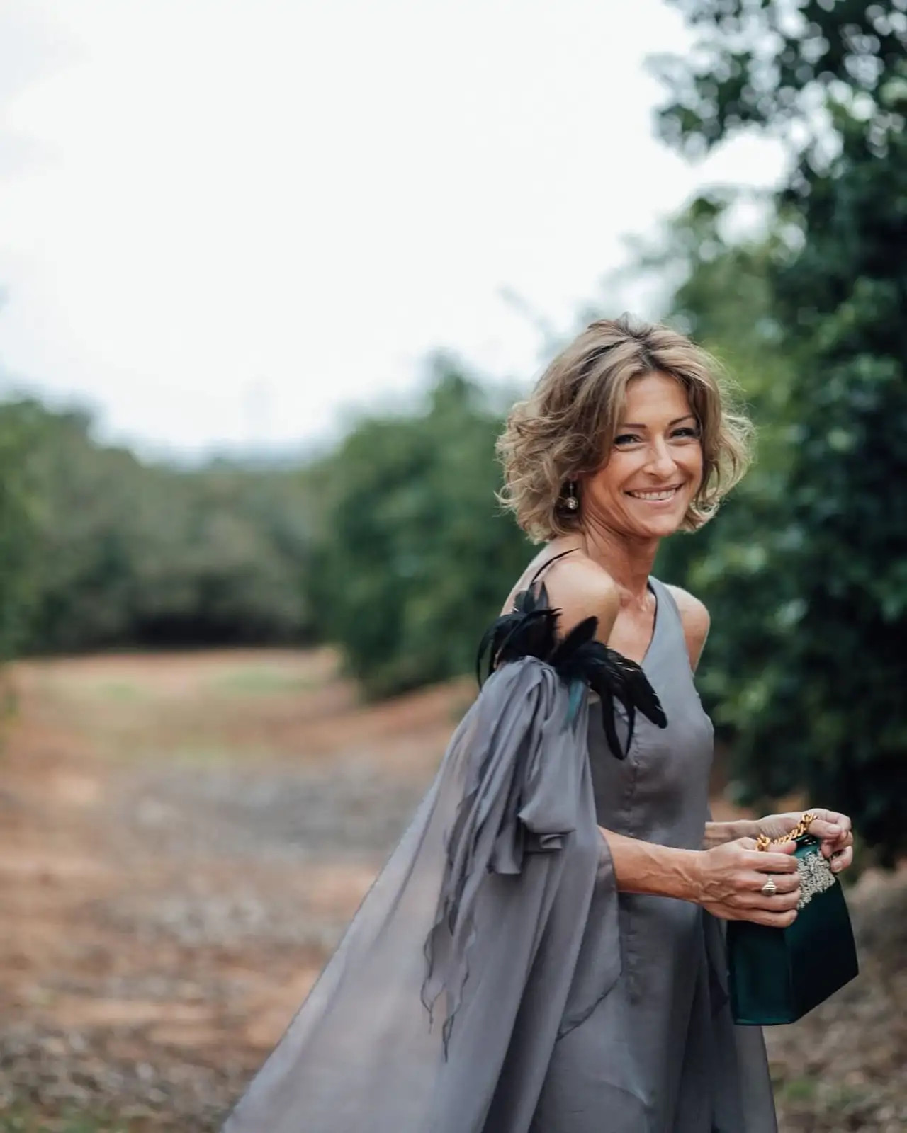 Sophisticated Cape: Grey Silk Dress with Feather Detail Sophisticated Cape: Grey Silk Dress with Feather Detail — Mothers Day Outfits 2027