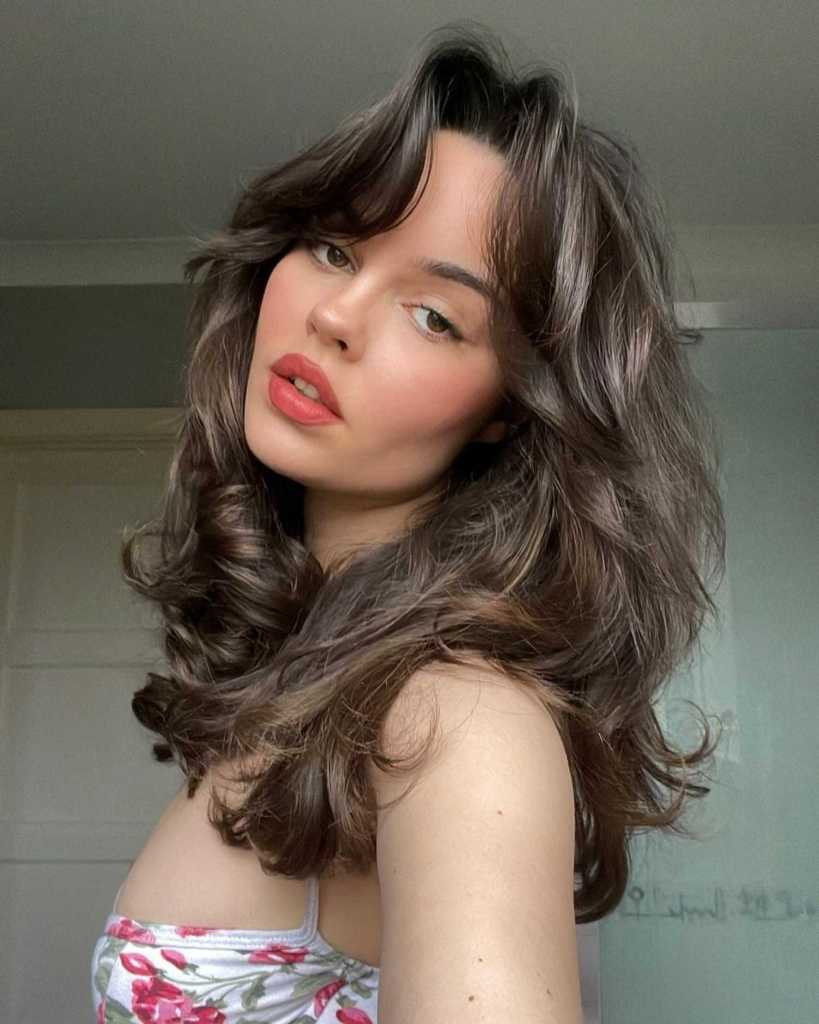 Long Voluminous Curls With Face-Framing Bangs Long Voluminous Curls With Face-Framing Bangs — Aesthetic Hairstyles 2027
