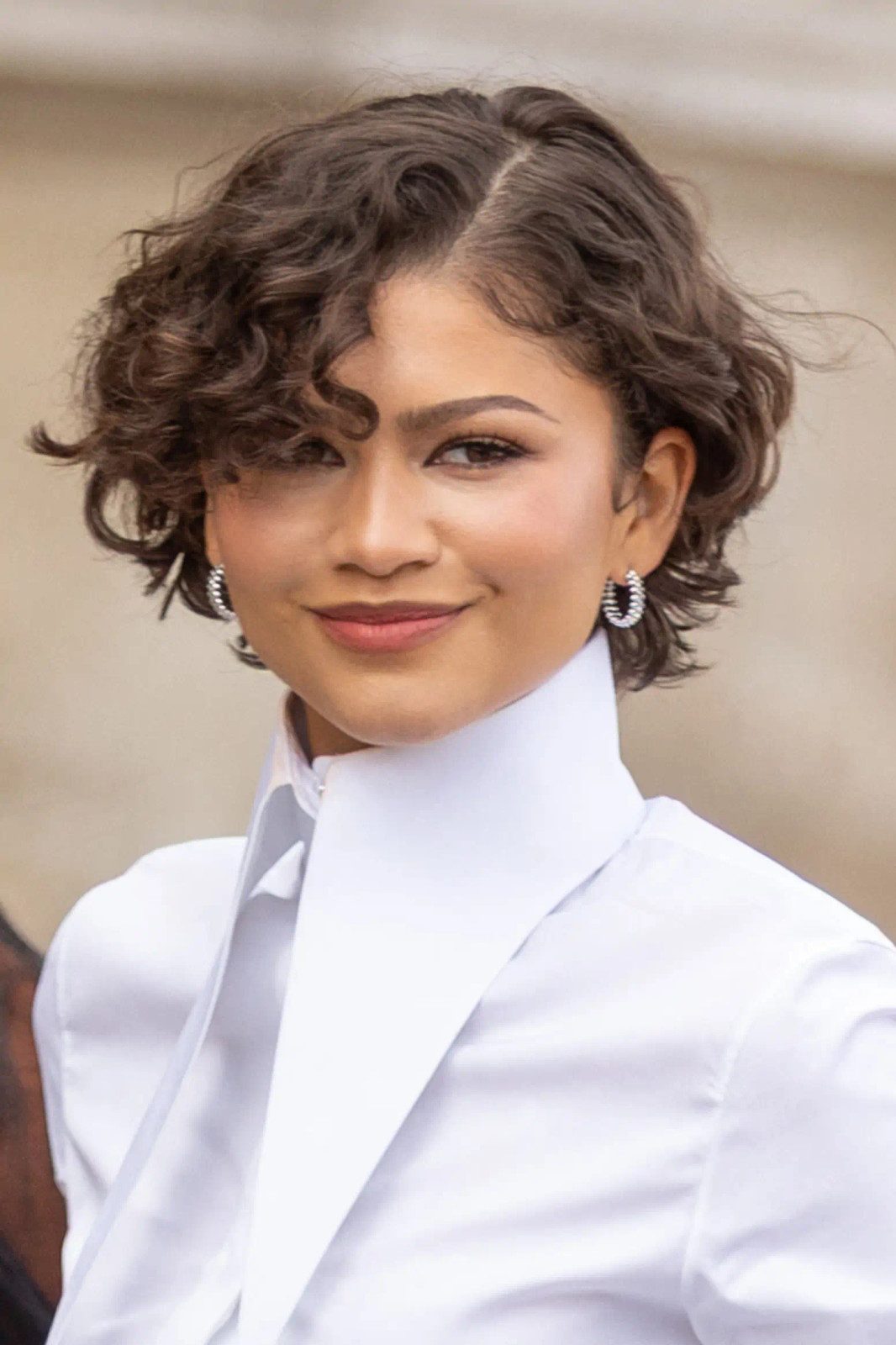 Textured Pixie With Swept Fringe Textured Pixie With Swept Fringe — Haircuts 2027 for Wavy Hair