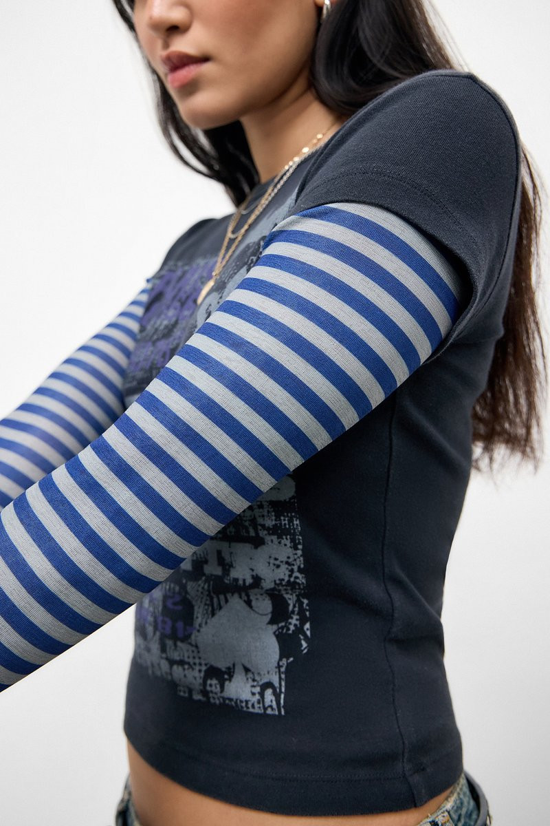 Graphic Tee Over Stripes: Layered Urban Texture Graphic Tee Over Stripes: Layered Urban Texture — Urban Outfitters Outfits 2027