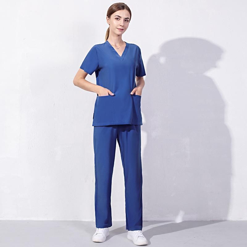 Royal Blue Drawstring Scrubs with White Sneakers — Nurse Outfits 2027