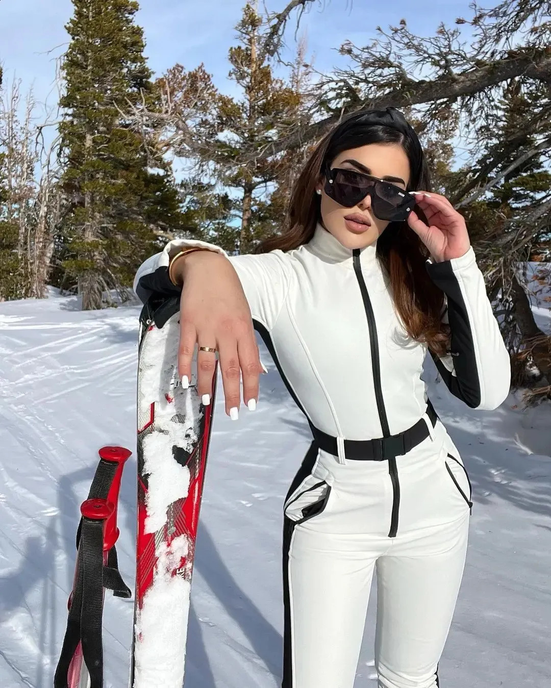 Fitted White and Black Ski Suit with Belt Fitted White and Black Ski Suit with Belt — Apres Ski Outfits 2027