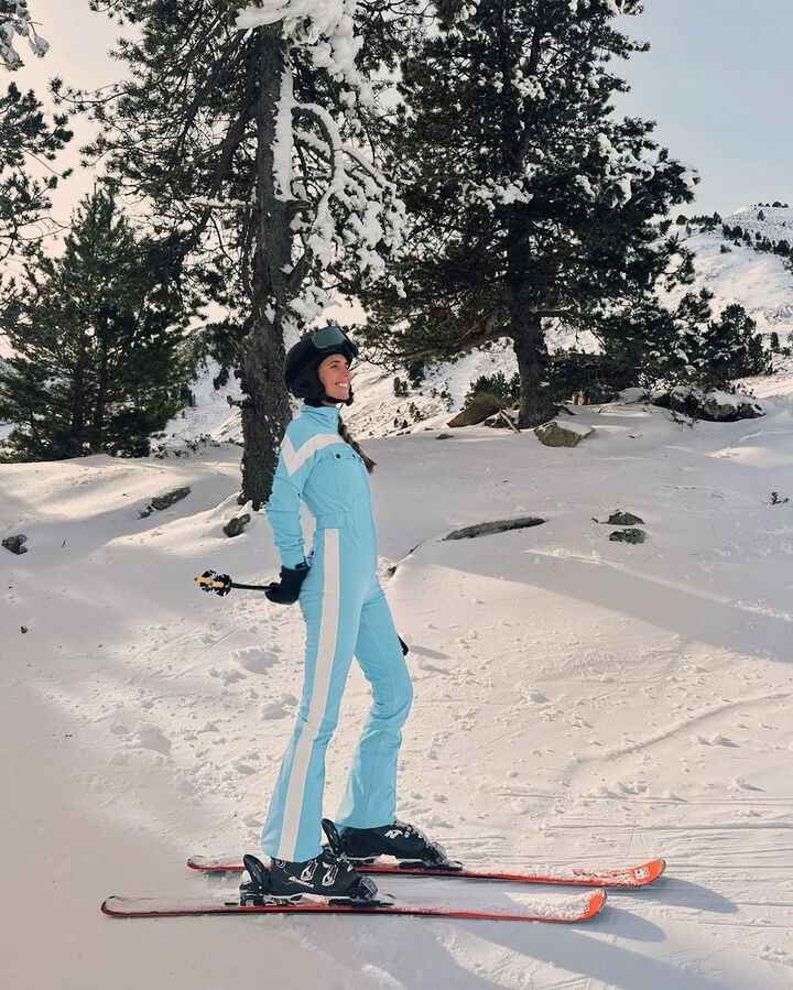 Light Blue Ski Suit with White Stripes and Flared Legs Light Blue Ski Suit with White Stripes and Flared Legs — Ski Outfits for Women 2027