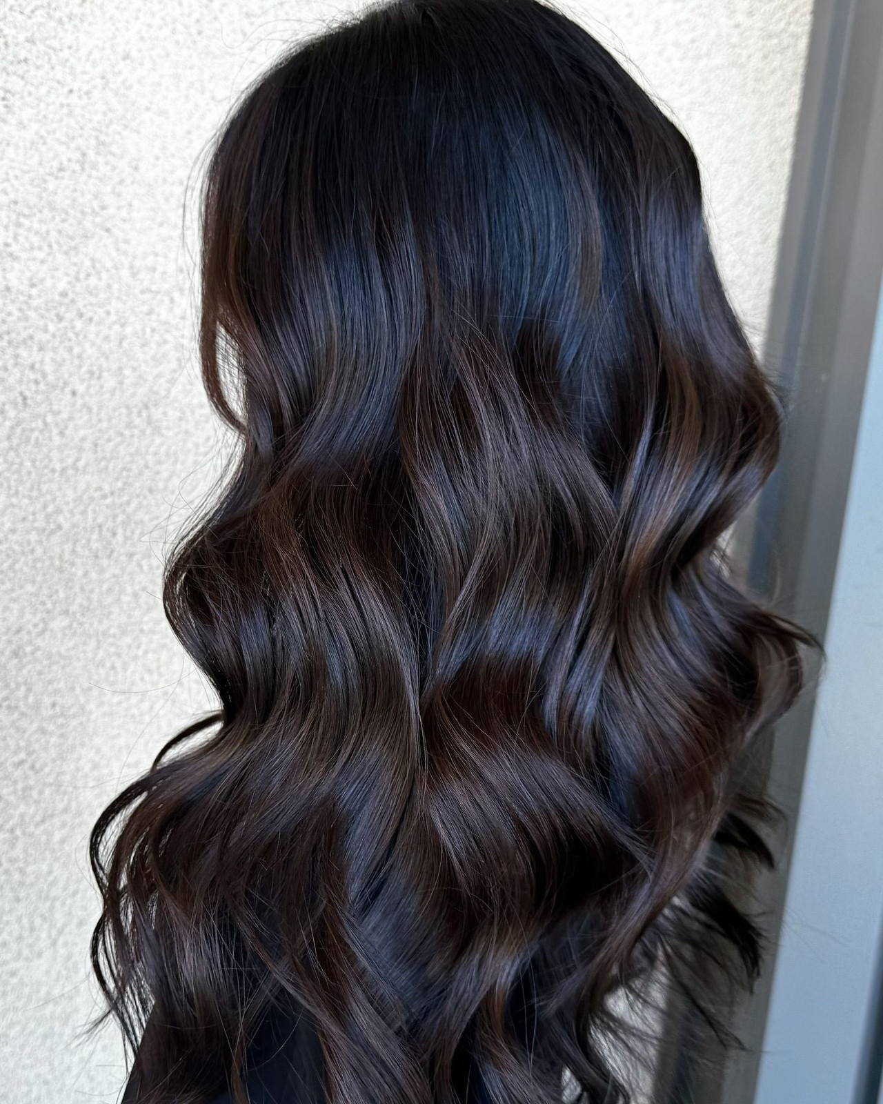 Glossy Deep Black Waves — Hair Color Ideas 2027 for Dark Hair