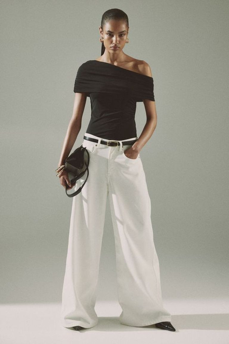 Chic Contrast: Off-the-Shoulder Top with White Trousers — Holiday Party Outfits 2026