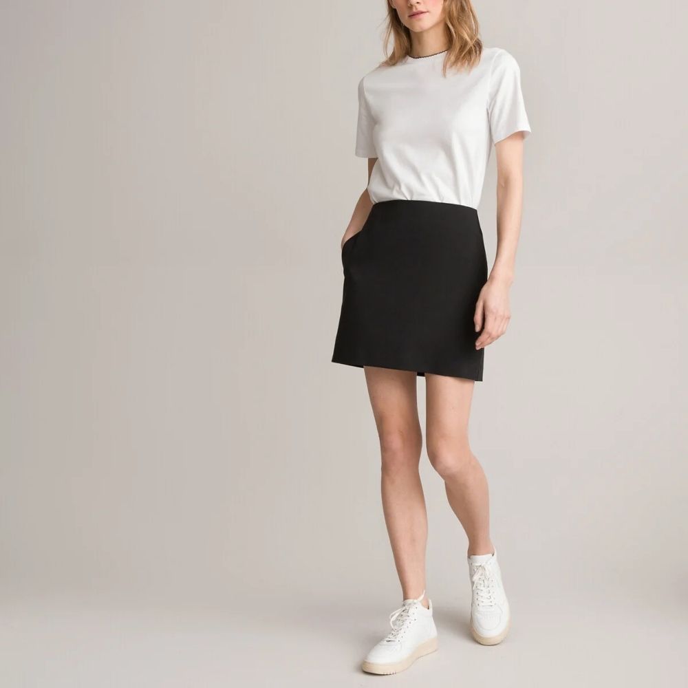 White T-Shirt and Black Mini Skirt with White Sneakers White T-Shirt and Black Mini Skirt with White Sneakers — White Sneakers Outfits 2027