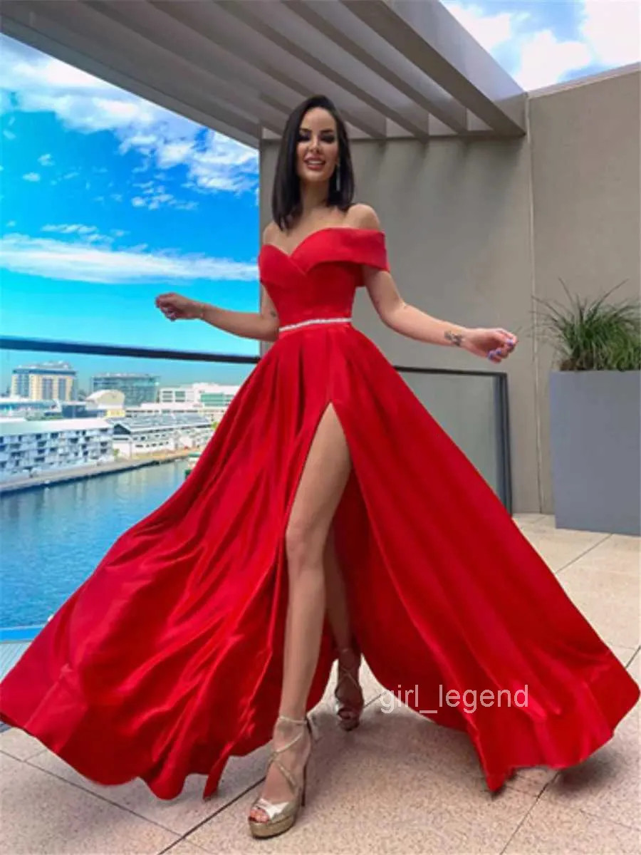 Red Satin Ballgown with Off-the-Shoulder Neckline and High Slit Red Satin Ballgown with Off-the-Shoulder Neckline and High Slit — Red Prom Dresses 2027