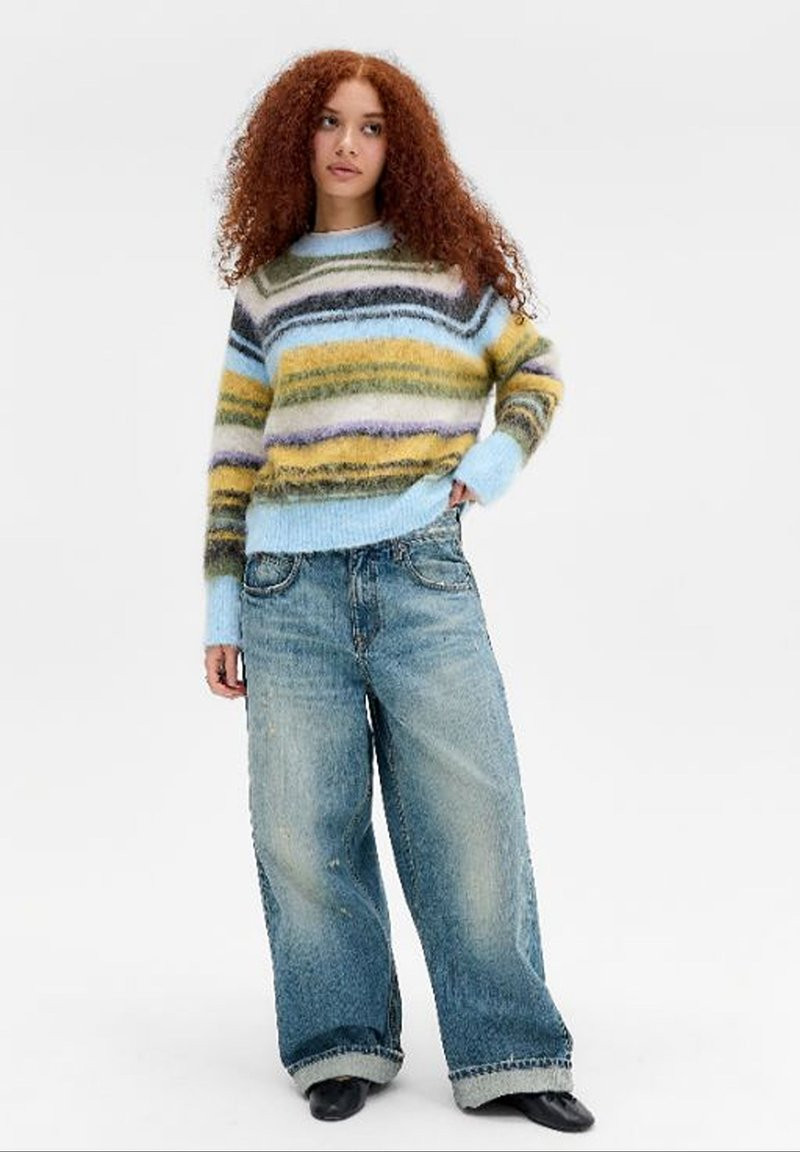 Multi-Coloured Stripe Sweater: Vibrant Layer for Casual Days Multi-Coloured Stripe Sweater: Vibrant Layer for Casual Days — Urban Outfitters Outfits 2027