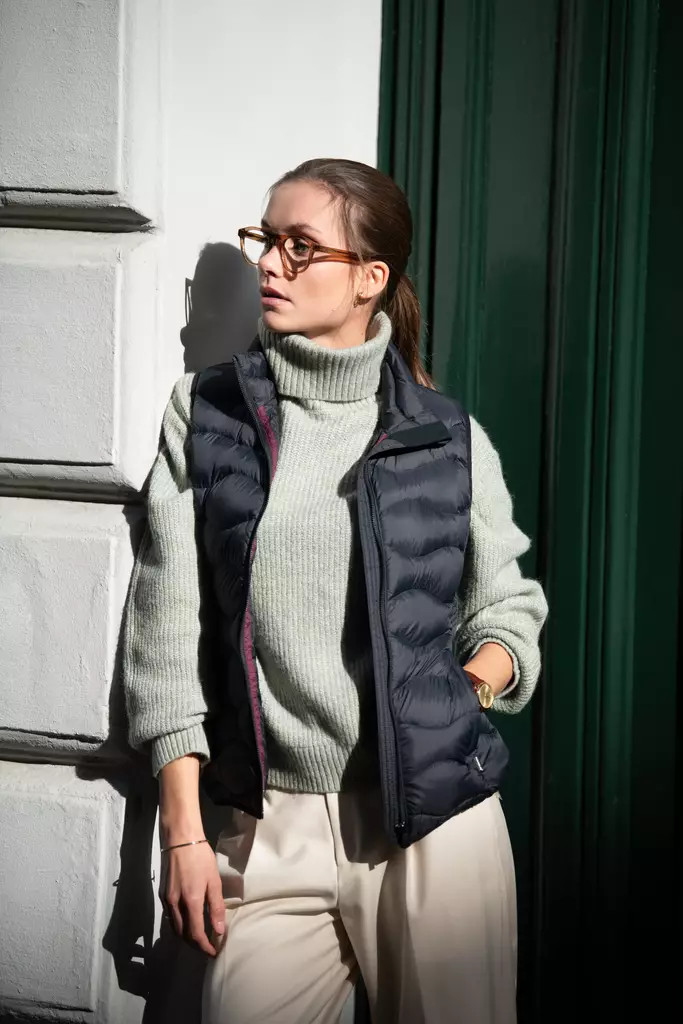 Subtle Contrast: Grey Vest with Light Grey Turtleneck and Cream Trousers Subtle Contrast: Grey Vest with Light Grey Turtleneck and Cream Trousers — Puffer Vest Outfits 2027