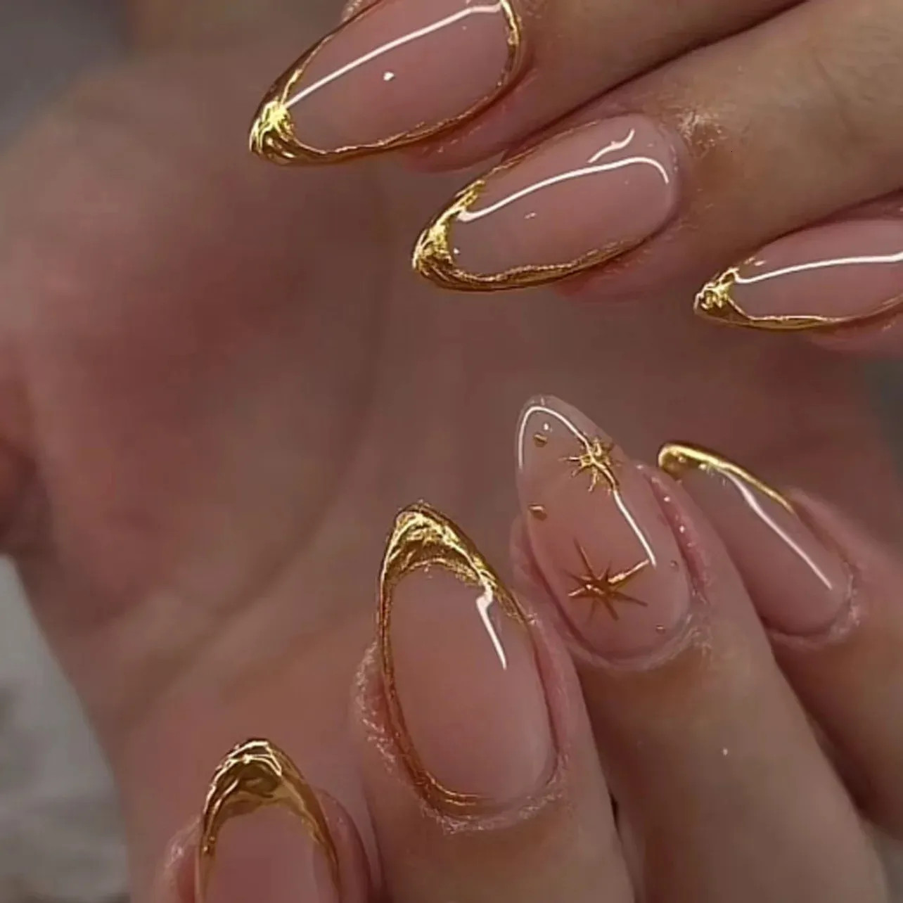 Glossy Metallic Nude Glossy Oval with Gold Tips Glossy Metallic Nude Glossy Oval with Gold Tips — Press On Nails 2027