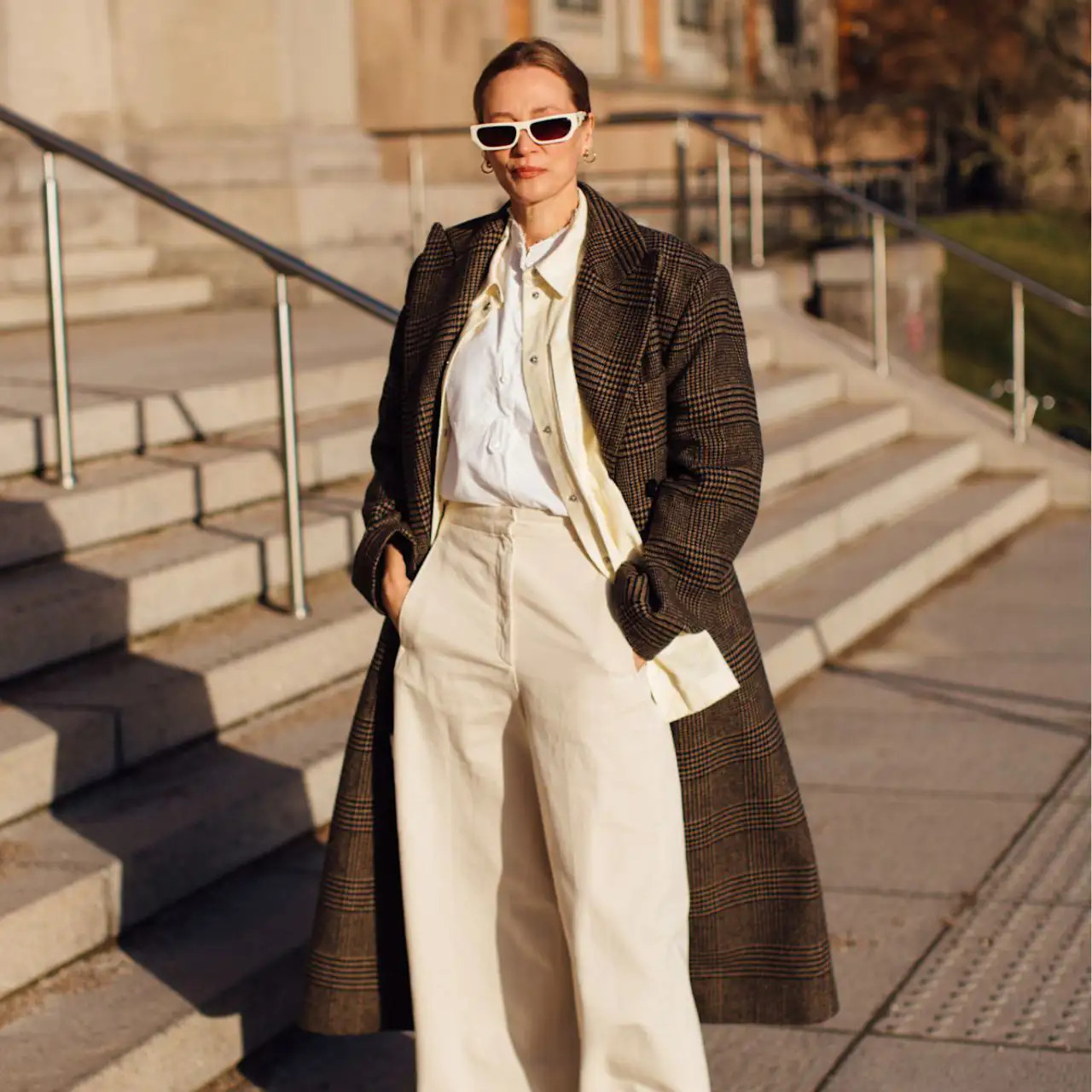 Classic Plaid Coat Over Cream Trousers for a Winter Interview Classic Plaid Coat Over Cream Trousers for a Winter Interview — Winter Interview Outfits 2027