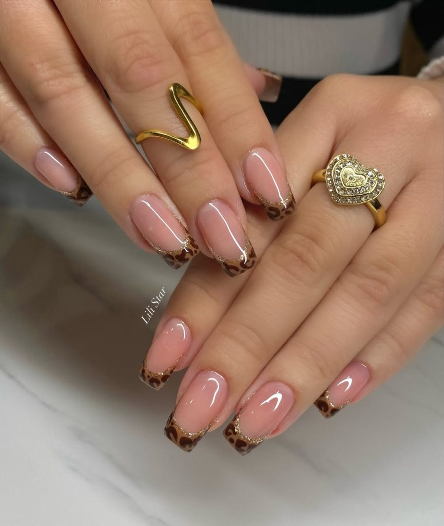 Nude Pink Leopard French Tips With Gold Glitter Nude Pink Leopard French Tips With Gold Glitter — Leopard Print Nails 2027