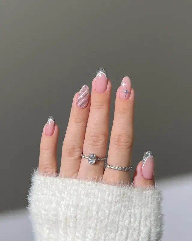 Glossy With Glitter Silver Glitter Swirl French Almond Glossy With Glitter Silver Glitter Swirl French Almond — Winter French Tip Nails 2027