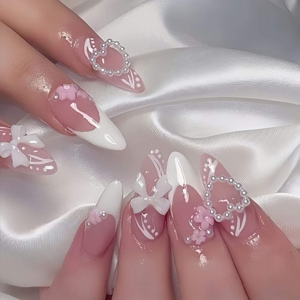 Glossy Sheer Pink French Stilettos with 3D Bows and Charms Glossy Sheer Pink French Stilettos with 3D Bows and Charms — Bow Stiletto Nails 2027