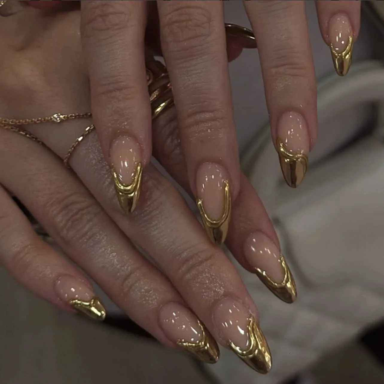 Glossy Nude Gold French Long Almond Nails Glossy Nude Gold French Long Almond Nails — Gold Nails 2027