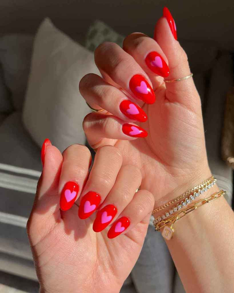 Pink Hearts on Red Glossy Almond Pink Hearts on Red Glossy Almond — Heart Nails 2027