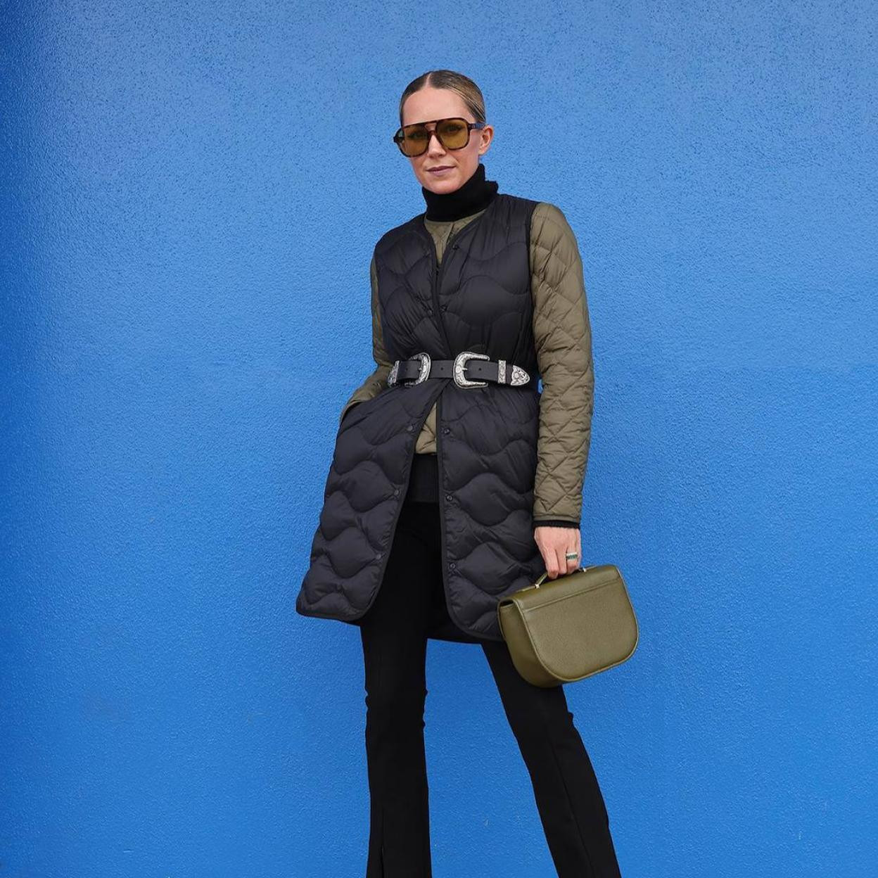 Polished Casual: Black Quilted Vest with Polo and Pointed Heels Polished Casual: Black Quilted Vest with Polo and Pointed Heels — Puffer Vest Outfits 2027
