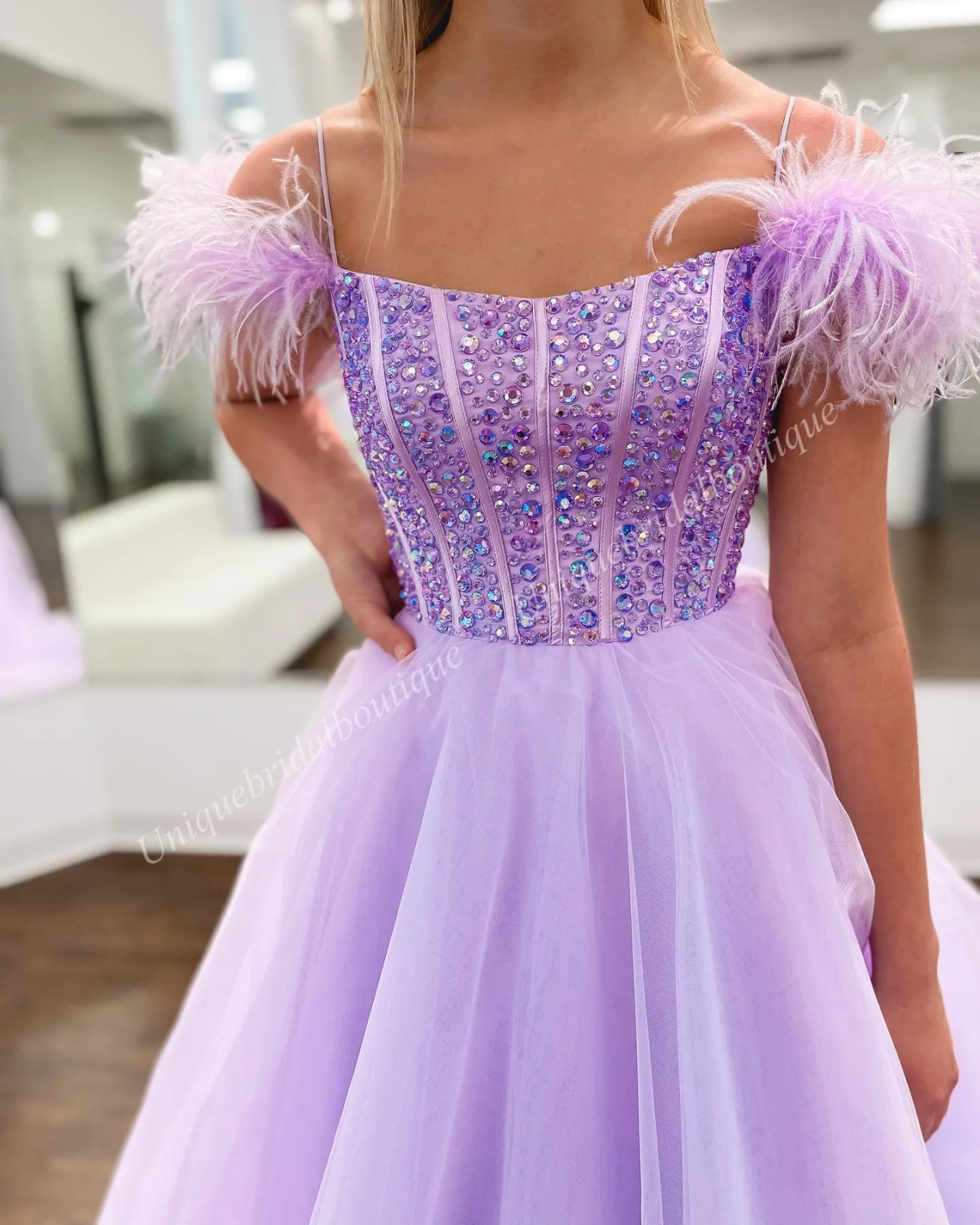 Lavender Corset Dress with Feather Details and Voluminous Tulle Skirt Lavender Corset Dress with Feather Details and Voluminous Tulle Skirt — Corset Prom Dresses 2027