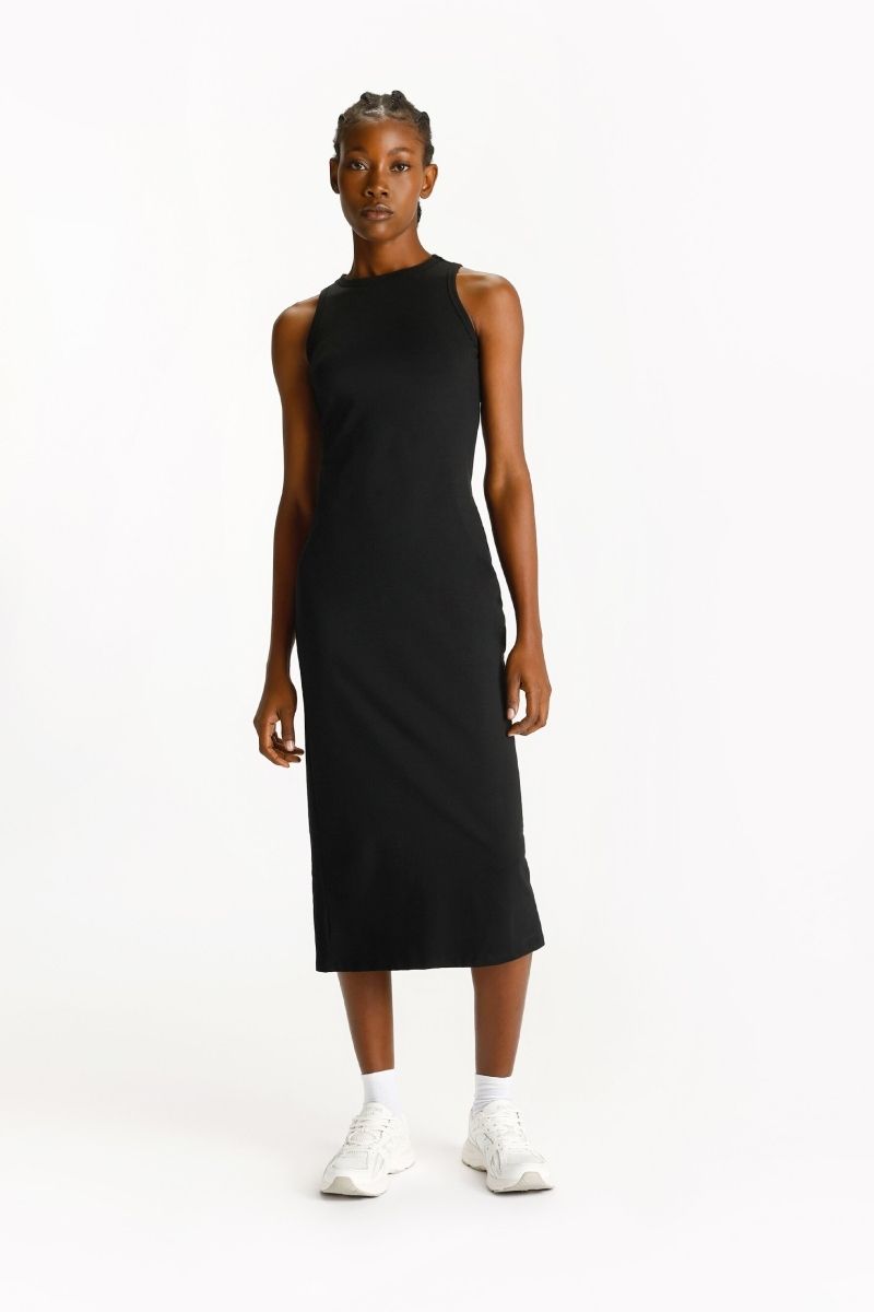 Black Midi Dress and White Socks with Low-Top Sneakers Black Midi Dress and White Socks with Low-Top Sneakers — White Sneakers Outfits 2027