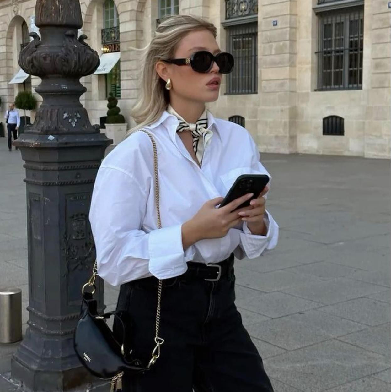 Oversized White Shirt with High-Waisted Black Jeans and Crescent Bag — French Girl Outfits 2027