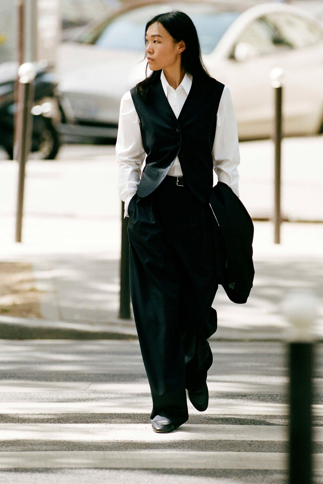 Layered Sophistication: Black Vest Over White Shirt with Wide-Leg Trousers — Summer Work Outfits 2027