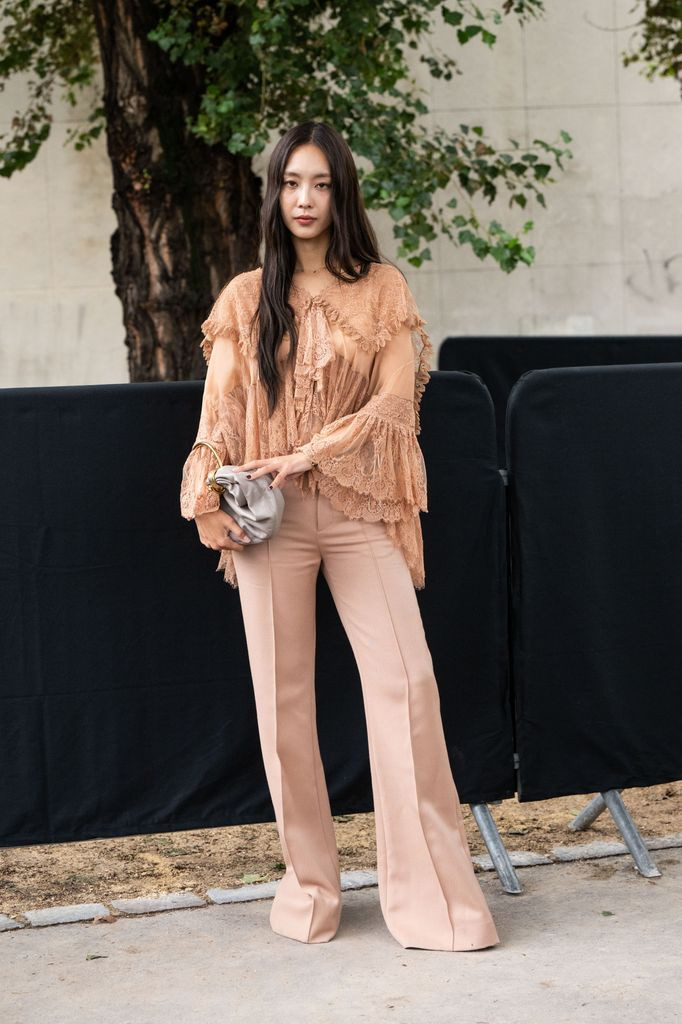 Sheer Peach Lace Ruffle Blouse with Beige Wide-Leg Trousers for Boho Chic Sheer Peach Lace Ruffle Blouse with Beige Wide-Leg Trousers for Boho Chic — Ruffle Top Outfits 2027