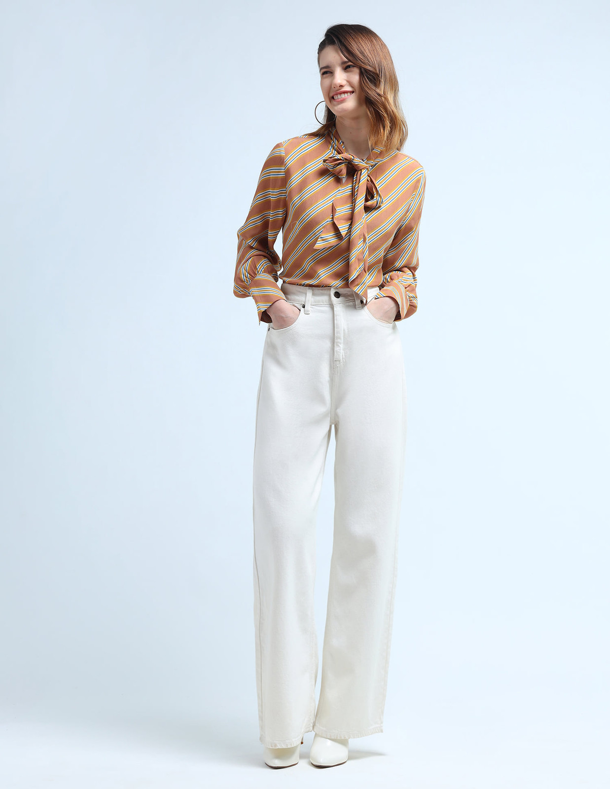 Striped Bow Tie Blouse with Wide-Leg Jeans for Relaxed Casual Style Striped Bow Tie Blouse with Wide-Leg Jeans for Relaxed Casual Style — Bow Tie Outfits for Women 2027