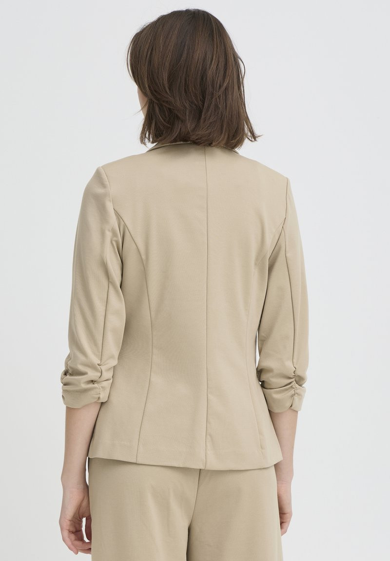 Savannah Tan Blazer with Ruched Sleeves for Business Casual Savannah Tan Blazer with Ruched Sleeves for Business Casual — Savannah Outfits 2027