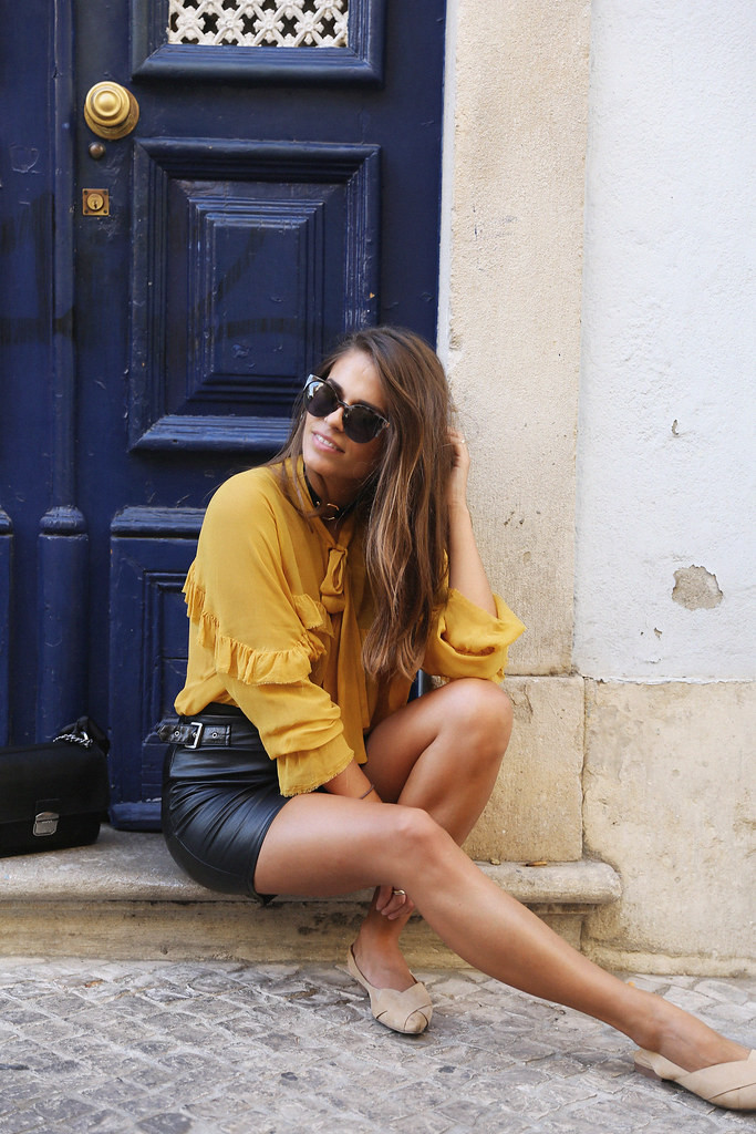 Mustard Ruffled Blouse with Leather Mini Skirt Mustard Ruffled Blouse with Leather Mini Skirt — Lisbon Outfits 2027