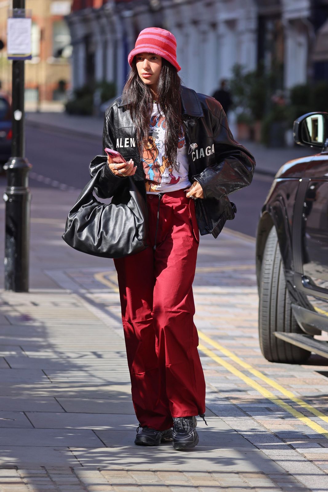 Leather Jacket, Graphic Tee, and Red Cargo Pants: Streetwear Baddie Leather Jacket, Graphic Tee, and Red Cargo Pants: Streetwear Baddie — Baddie Outfits 2027