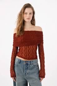 Red Off-Shoulder Mesh Top With Blue Denim Jeans — She Is Also Wearing Blue Denim Jeans — Mesh Top Outfits 2027