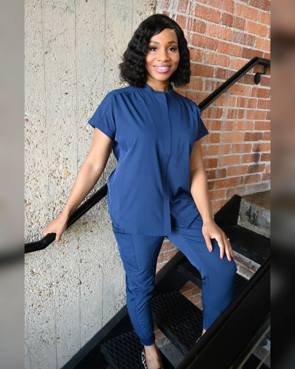 Navy Blue Jogger Scrubs with Mandarin Collar and Leopard Print Shoes Navy Blue Jogger Scrubs with Mandarin Collar and Leopard Print Shoes — Scrubs Outfits 2027