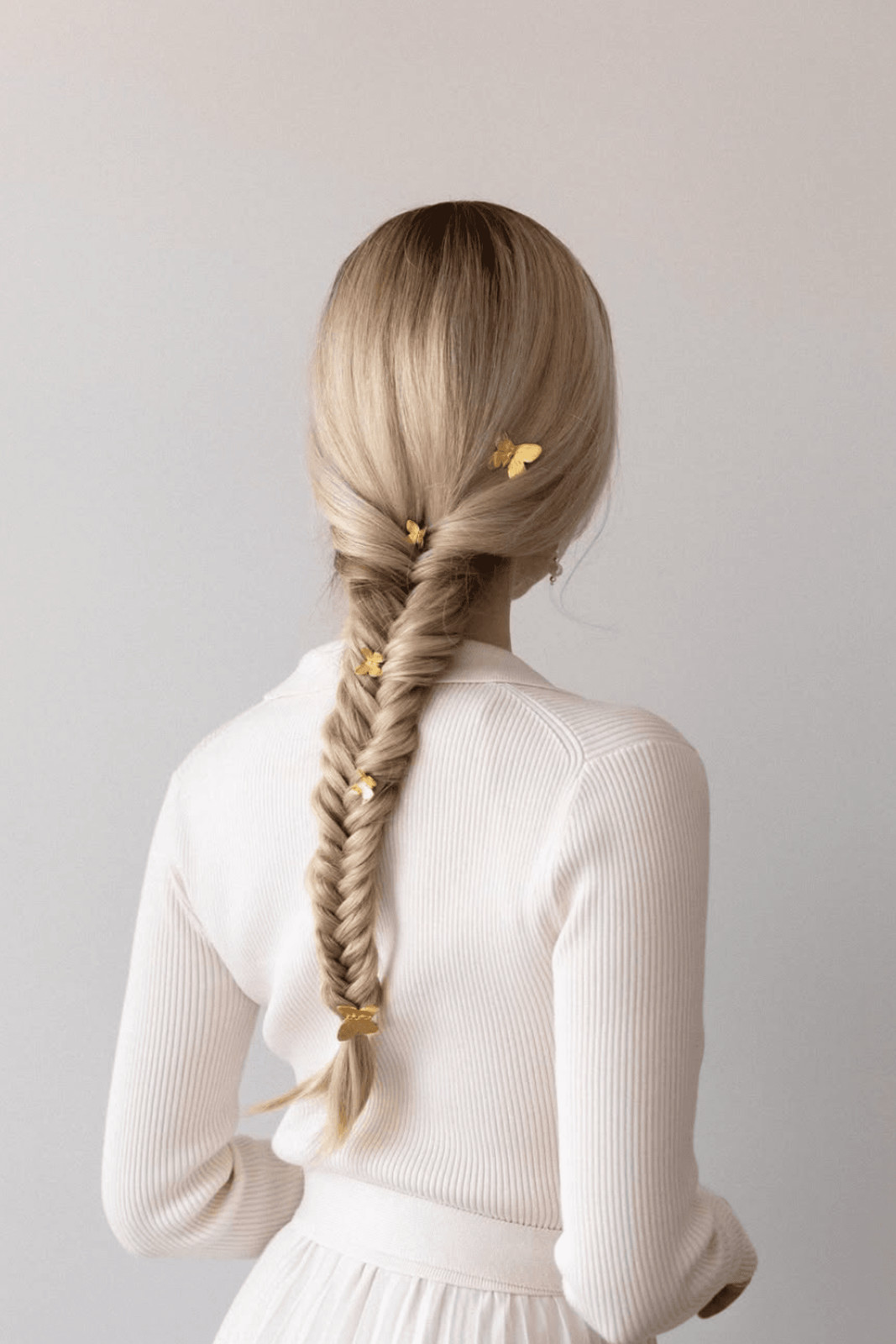 Light Blonde Dutch Braids With Pink Bows Light Blonde Dutch Braids With Pink Bows — Christmas Braids 2026