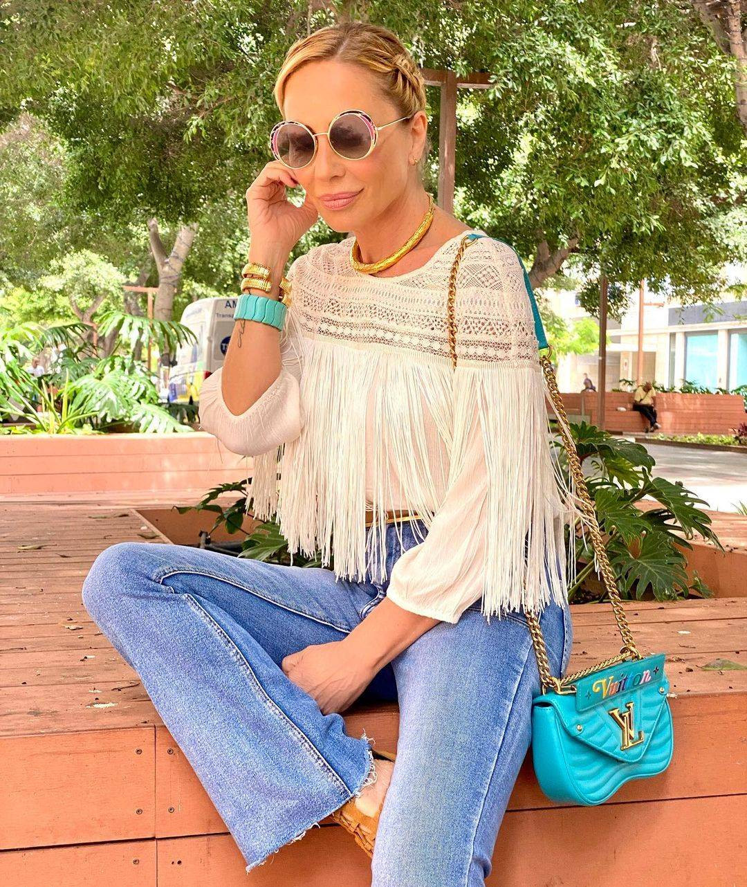 Blue Denim Flare Pants with White Fringe Boho Top and Tan Sandals Blue Denim Flare Pants with White Fringe Boho Top and Tan Sandals — Skinny Flare Pants Outfits 2027