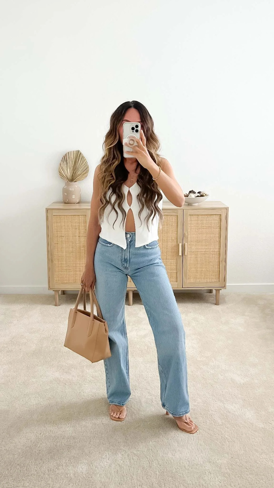 Cutout Halter Top and Wide-Leg Jeans for a Modern Spring Casual Look Cutout Halter Top and Wide-Leg Jeans for a Modern Spring Casual Look — Spring Casual Outfits 2027