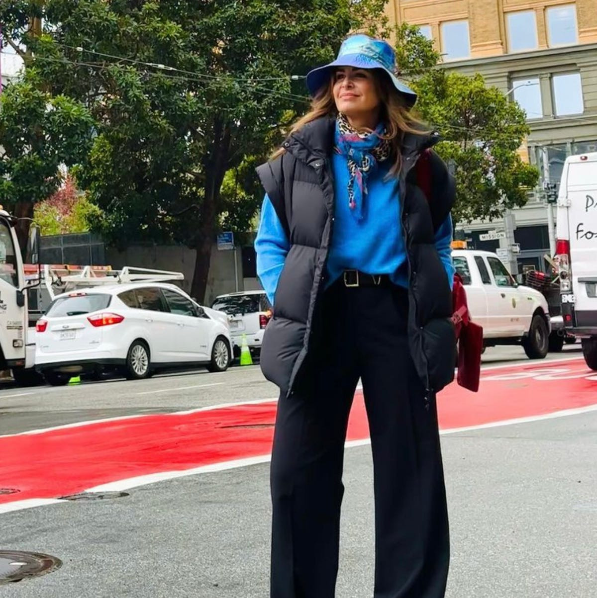 Winter Layers: Black Vest with Blue Sweater and Bold Accessories Winter Layers: Black Vest with Blue Sweater and Bold Accessories — Puffer Vest Outfits 2027