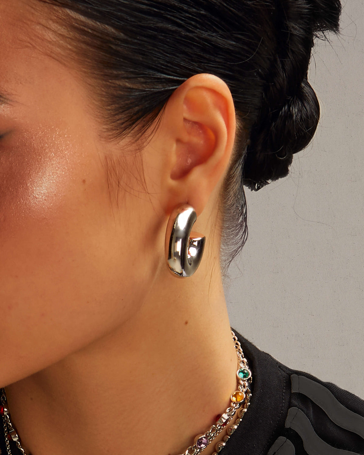 Thick Polished Hoops: Elevating a Simple Black Top Thick Polished Hoops: Elevating a Simple Black Top — Silver Hoops Outfits 2027