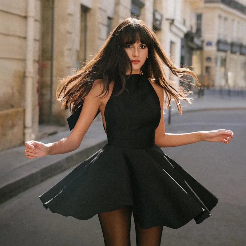 Dramatic Black Fit-and-Flare Mini Dress with Bow Detail — Mini Dresses 2027
