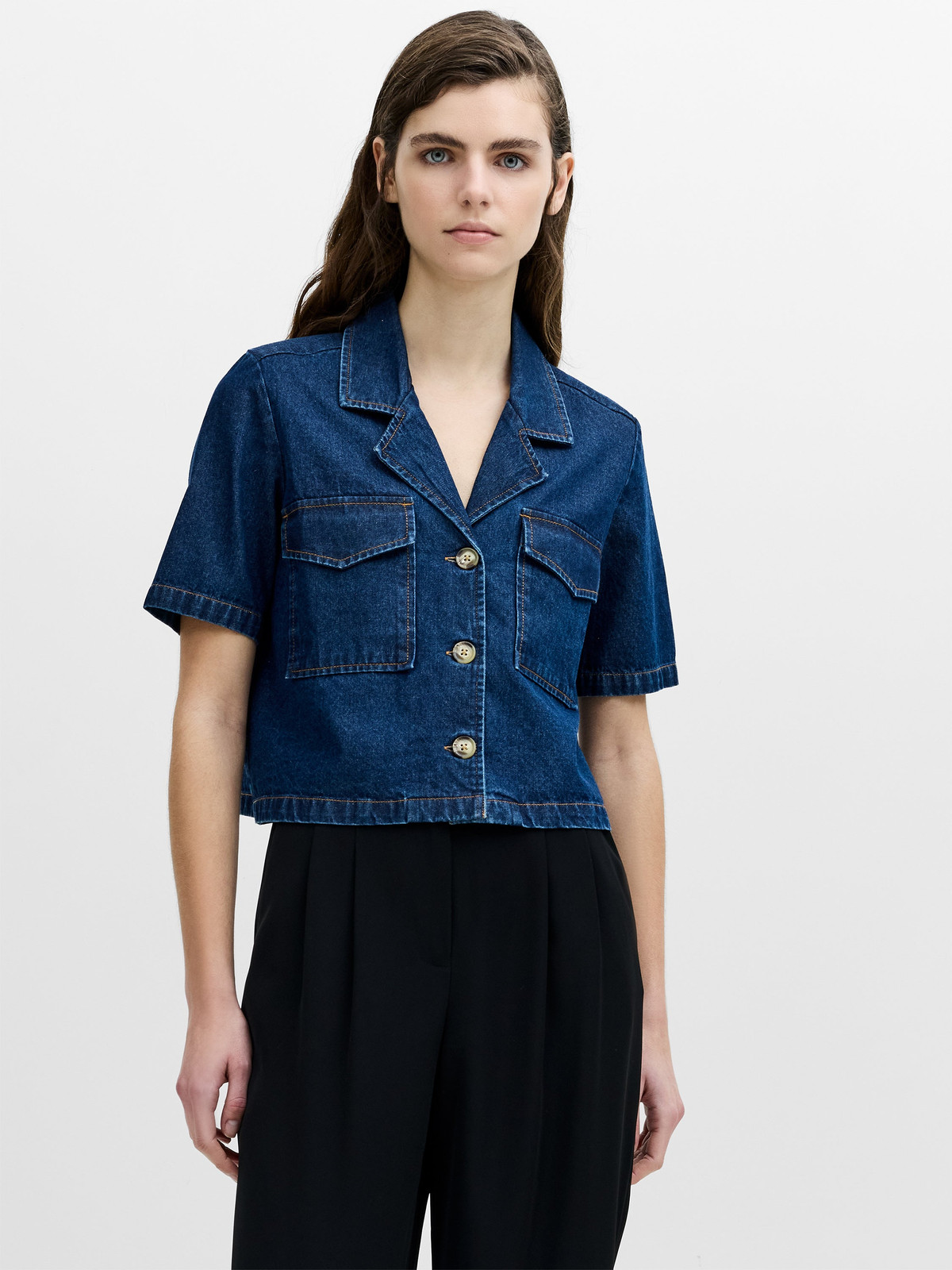 Cropped Dark Blue Denim Shirt with Pleated Trousers Cropped Dark Blue Denim Shirt with Pleated Trousers — Denim Shirt Outfits 2027