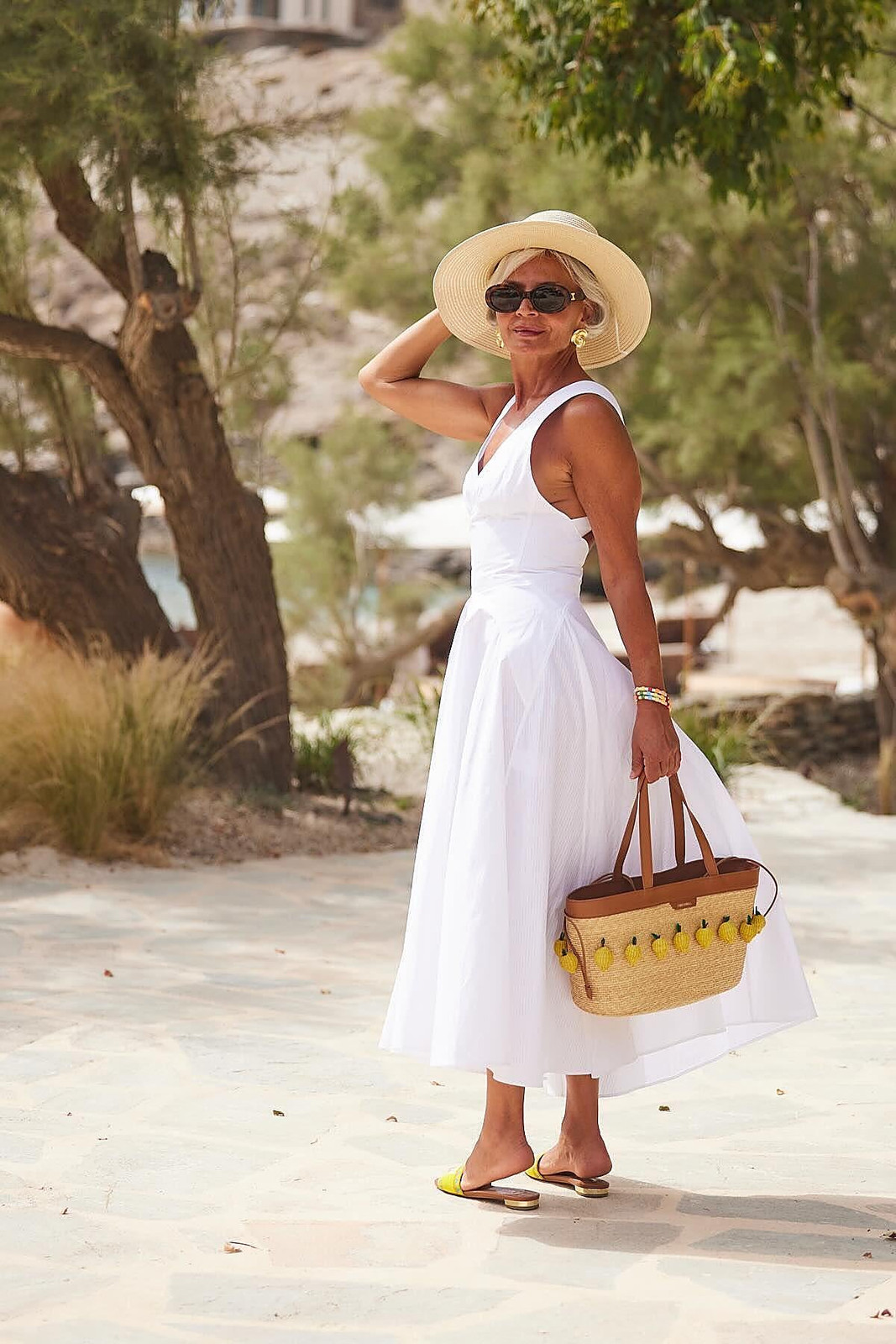 White Fit-and-Flare Midi Sundress with Straw Accessories White Fit-and-Flare Midi Sundress with Straw Accessories — Sundress Outfits 2027