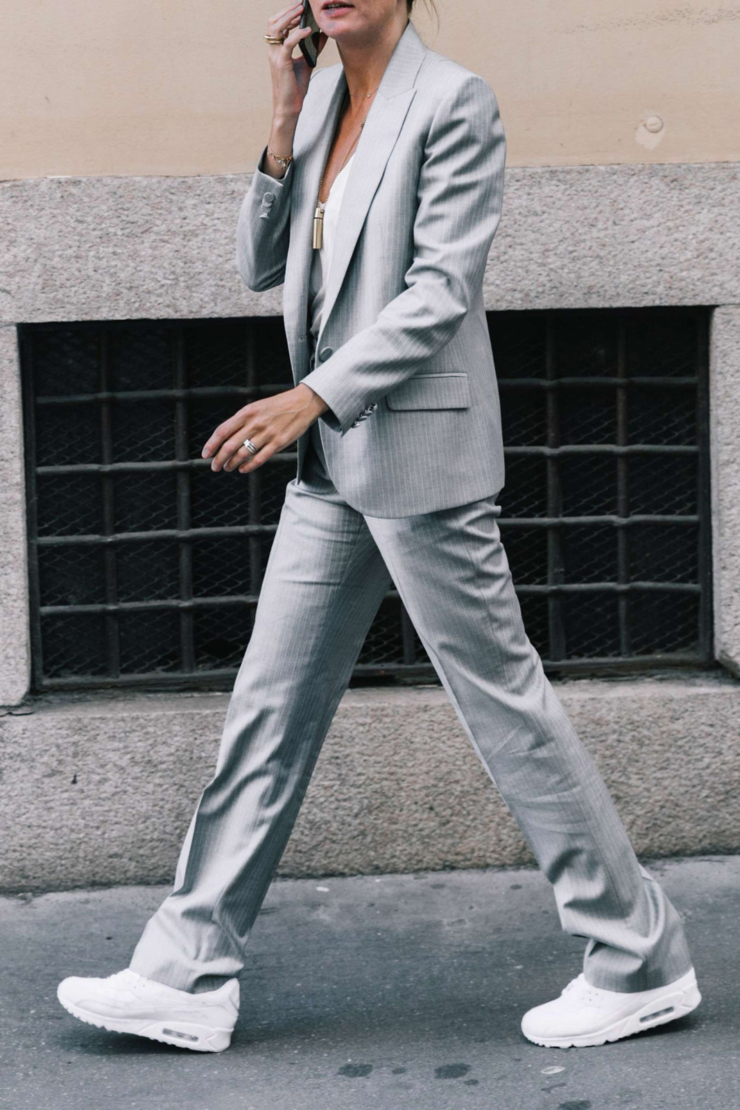 Pinstripe Suit with White Camisole and White Sneakers Pinstripe Suit with White Camisole and White Sneakers — Spring Outfits 2027 with Sneakers
